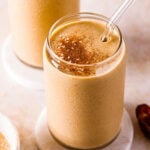 picture of a delicious snickerdoodle tahini smoothie with dates on the side
