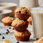 A stack of three gut-healthy mini banana chocolate chip buckwheat muffins