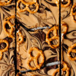 A close up image of the high protein chocolate peanut butter pretzel bark, cut into squares