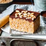 One of the classic peanut butter rice crispy treats, laid out on a wire cooling rack