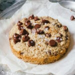 A tray with the single serving chocolate chip scone sitting on top of it