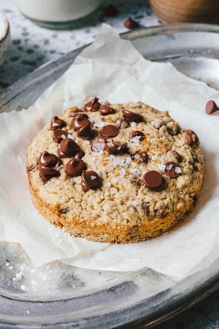 A tray with the single serving chocolate chip scone sitting on top of it