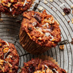 A wire cooling rack, topped with the gut healthy pumpkin morning glory muffins
