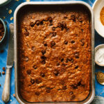 A tray of the sheet pan banana bread, laid out on a countertop