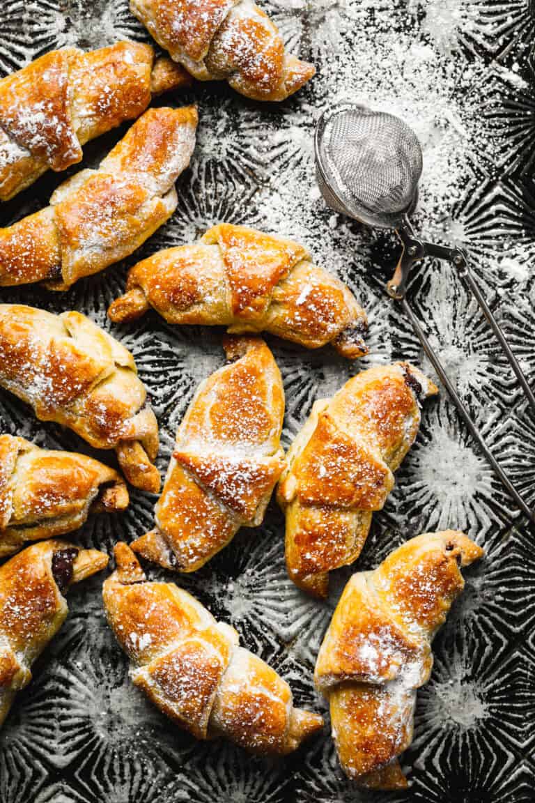 A bunch of the mini Nutella croissants, laid out on a countertop