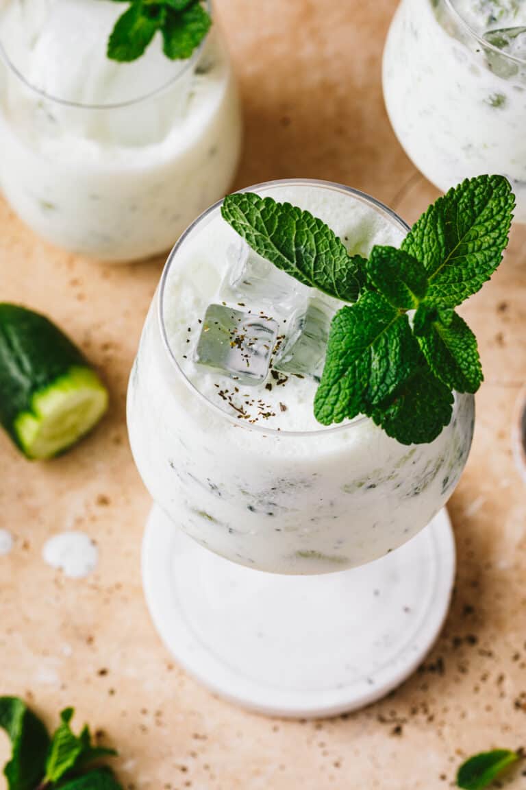 An overhead shot of a glass of the Armenian yogurt drink
