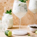 A tall glass of the Armenian yogurt drink (tahn), sitting on a countertop