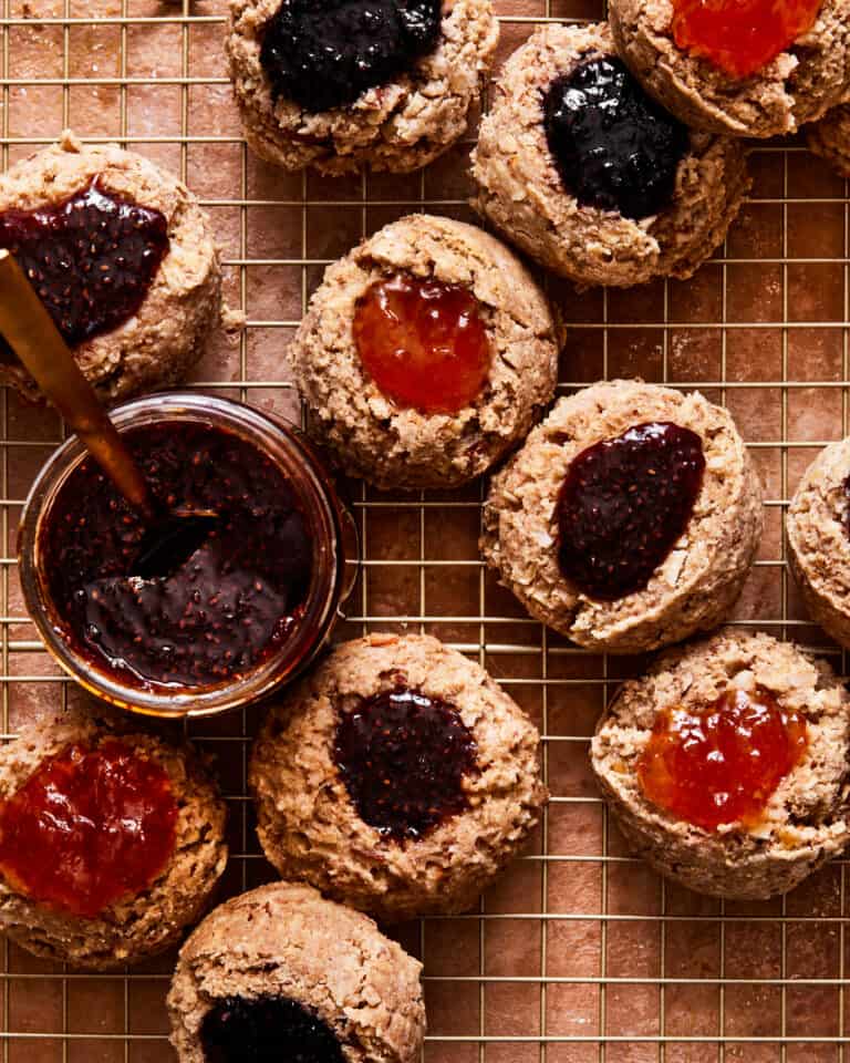 A wire cooling rack, topped with the famous golden door jam cookies