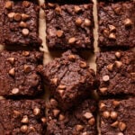 A close-up image of the healthy chickpea brownies, cut into squares, with the focus on one of the squares