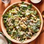 A bowl of the chicken caesar pasta salad, sitting on a countertop