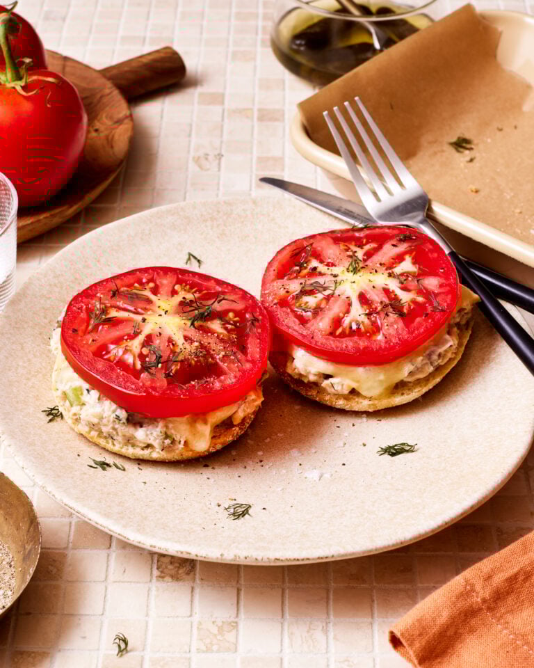 A plate of the high-protein salmon melts, sitting on a countertop with a fork next to the plate