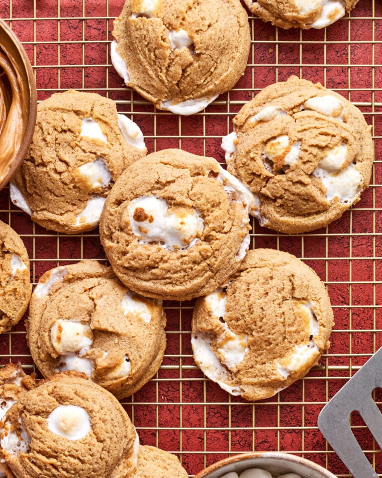 A close-up image of the gluten-free peanut butter marshmallow cookies, sitting on a wire cooling rack