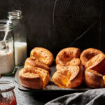 A tray filled with the easy 5-ingredient popovers, sitting on a countertop