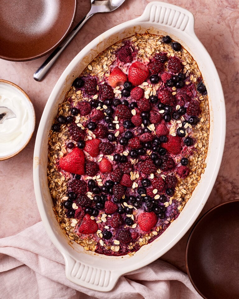 A pan of the mixed berry protein oatmeal, sitting on a countertop