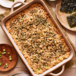 A tray full of the easy salmon sushi bake, sitting on a countertop