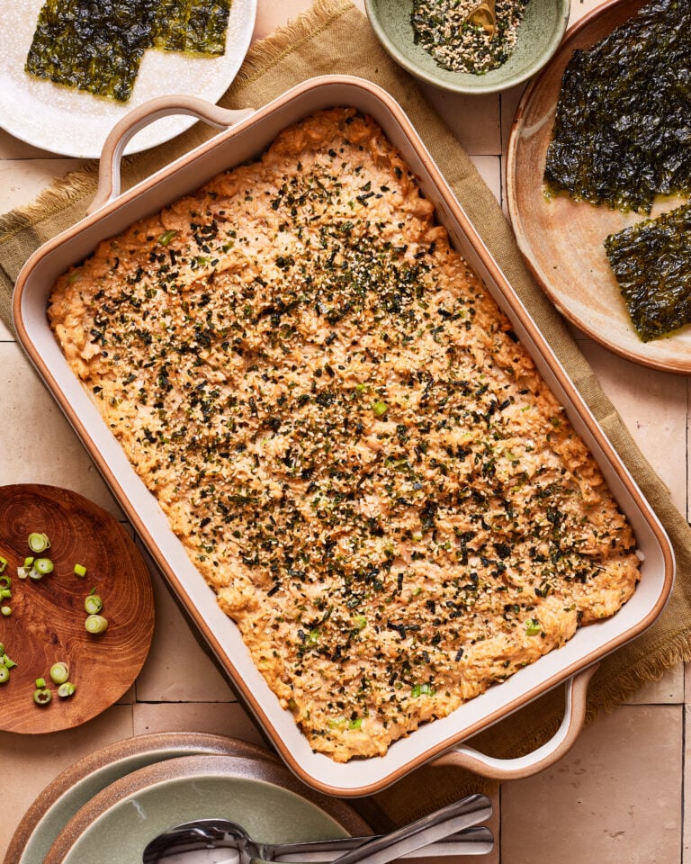 A tray full of the easy salmon sushi bake, sitting on a countertop