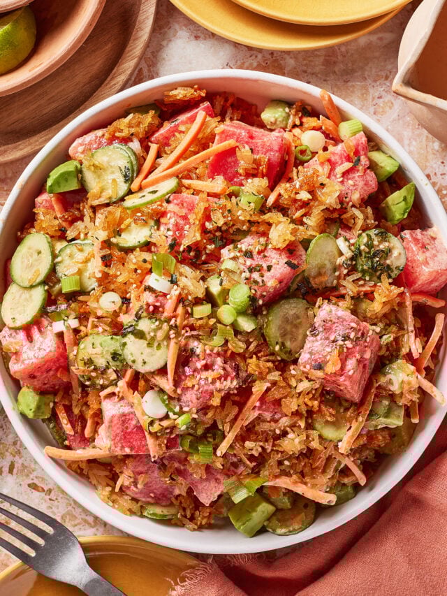 A bowl of crispy rice watermelon poke on a table.