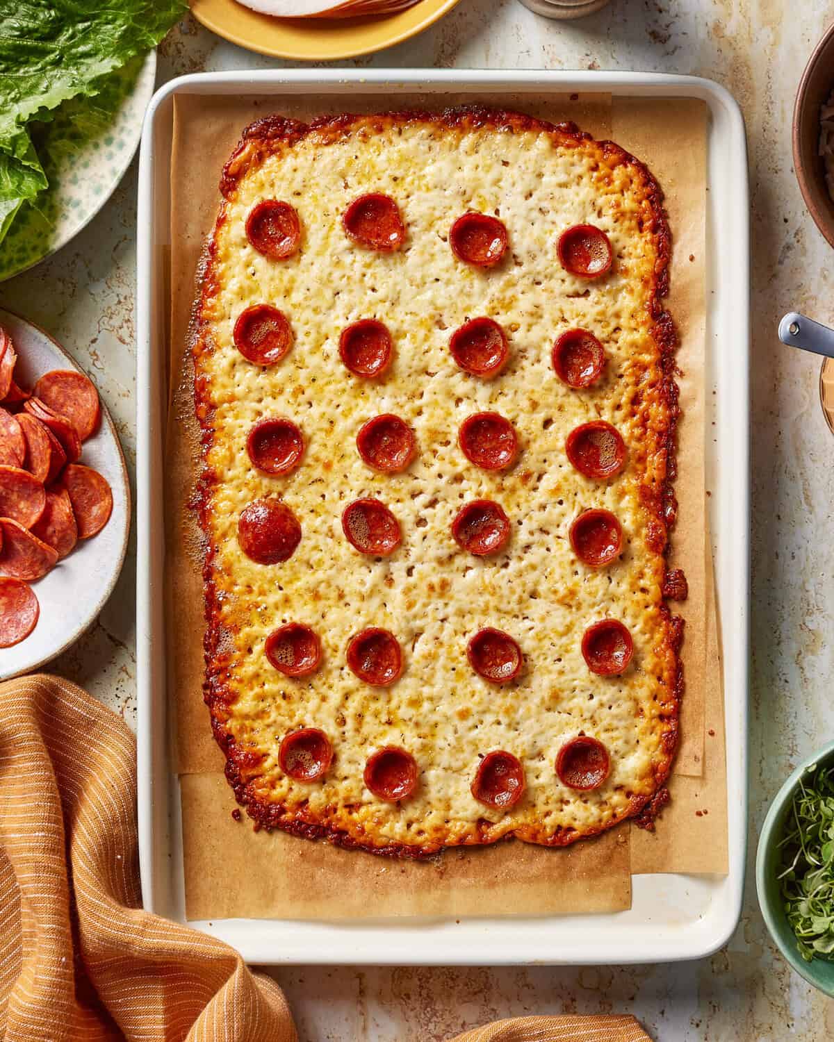 A pizza on a tray.