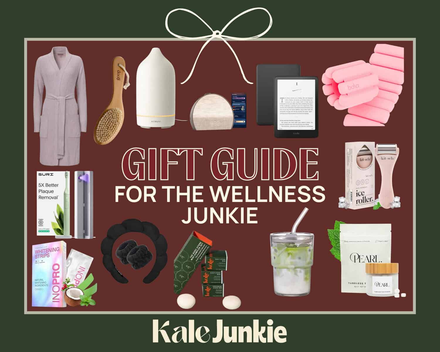A collage titled "Gift Guide for the Wellness Junkie" featuring wellness gifts like a robe, body brush, essential oil diffuser, salt lamp, Kindle, Pilates bar, water bottle, plaque remover, sleep mask, bath bombs, face rollers, tea, and skincare items.