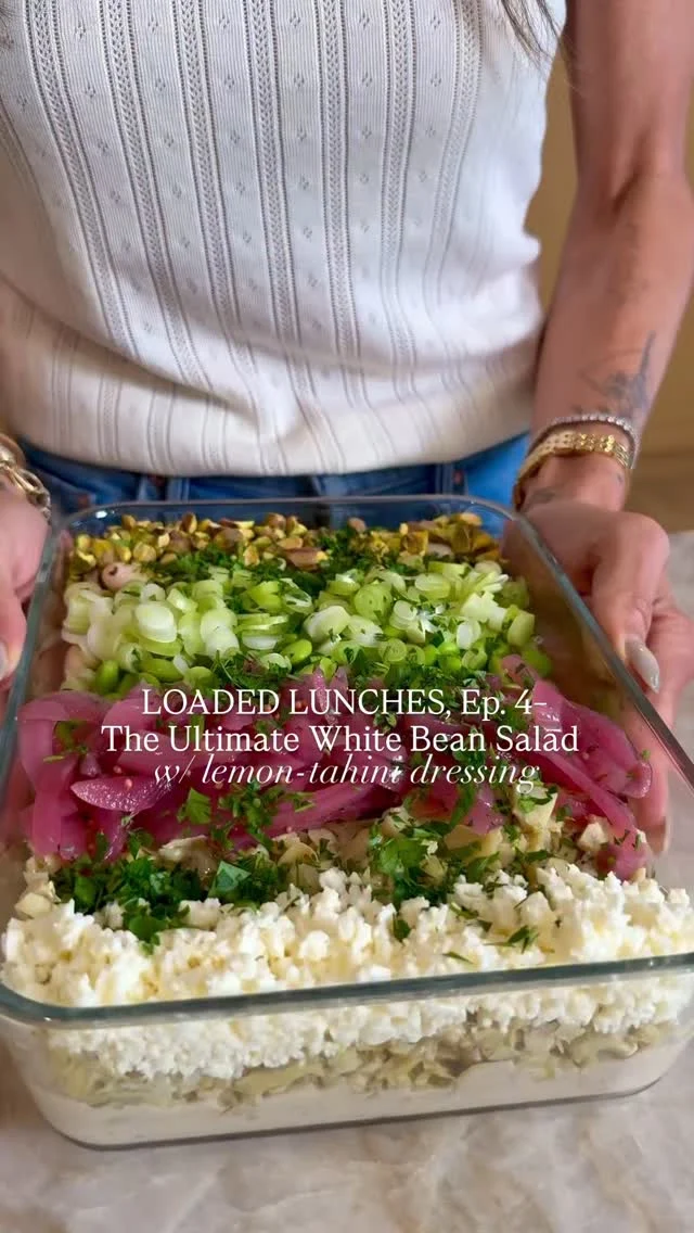 @kalejunkie LOADED LUNCHES, ep.4 —ULTIMATE WHITE BEAN SALAD WITH LEMON-TAHINI DRESSING, another meal preppable lunch that is packed with fiber, protein and tons of flavor, guaranteed to keep you full! I don’t meal prep often, so when I do, TRUST ME, it’s a good one 😏!⁣
⁣
Comment LINK and I will DM you the link to my fav storage containers that suck the air out!⁣
⁣
Makes 6 servings⁣
Salad—⁣
2 15oz cans white beans (canellini or great northern), drained and rinsed⁣
1 cup shelled edamame⁣
1 cup marinated artichoke hearts, drained and chopped⁣
3 green onions, finely sliced⁣
3/4 cup pickled onions⁣
1/4 cup feta cheese, crumbled⁣
1/4 cup italian parsley, finely chopped⁣
1/2 cup roasted, salted pistachios, roughly chopped⁣
⁣
Lemon Tahini Dressing—⁣
¼ cup lemon juice⁣
⅓ cup olive oil⁣
3 tb tahini⁣
2 tb honey⁣
2 tb red wine vinegar⁣
1 clove garlic, mashed⁣
1 tsp sea salt⁣
1 tsp black pepper⁣
Water to thin, as needed⁣
⁣
Prepare dressing—add all of the sauce ingredients to a small blender and blend until creamy and smooth. Taste and add water to thin as needed, then pour into the bottom of a large container or bowl. Drain and rinse beans well and add them to the container/bowl, along with the rest of the salad ingredients. Cover and store in the refrigerator. When you are ready to eat, shake the container victoriously, so that the dressing coats the entire salad. Eat and enjoy!