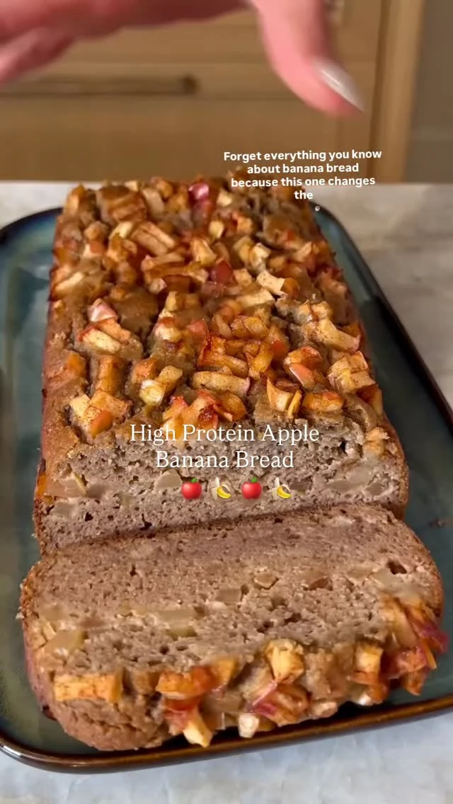 @kalejunkie 🍎🍌HIGH PROTEIN APPLE BANANA BREAD…the perfect transition into fall baking 👩🏻‍🍳. But unlike other sugar filled treats that leave you in a food coma, this one is packed with protein and fiber to keep you feeling fuller, longer. It’s great to enjoy for breakfast or any time of the day, and it freezes well too. So go ahead, double the recipe and make two loaves; one to eat and one to freeze for later🙂.⁣
⁣
Comment LINKS and I will send you the link to these genius silicone loaf liners, fav loaf pan, and blender!⁣
⁣
Makes 8-10 slices⁣
2 tsp avocado oil⁣
2 apples of choice, chopped (I use honey crisp)⁣
3 tsp cinnamon, divided⁣
2 very ripe bananas⁣
2 eggs⁣
2 tsp vanilla extract ⁣
1/2 cup cottage cheese⁣
1/4 cup maple syrup ⁣
2 1/4 cups almond flour⁣
1 1/4 tsp baking soda⁣
⁣
Preheat oven to 350F. Line a standard size loaf pan with parchment paper (or the amazing silicone liner I’m using). Chop apples into small pieces. Add avocado oil to a pan over medium heat. Once the pan is hot, add the apples and two teaspoons of the cinnamon. Stir and let cook down for about 5 minutes, then remove from the heat and set aside. Next, in a blender, add the banana, eggs, vanilla, cottage cheese and maple syrup. Blend until smooth and set aside. Then, in a large bowl, mix together the dry ingredients—almond flour, baking soda and one teaspoon of the cinnamon. Pour in the liquid ingredients from the blender and mix well so there are no clumps. Pour half of the mixture into the pan and an even layer, followed by half of the apple mixture. Add remaining batter on top, followed by the remaining apple pieces. Shake the pan/tap it on the counter if necessary so everything is even. Bake for 55-60 minutes or until a toothpick comes out clean. Note, you can cover the pan with foil after 30 minutes or so if the top is starting to brown too much. Let cool completely, cut into slices and enjoy! #fallbaking #healthybaking