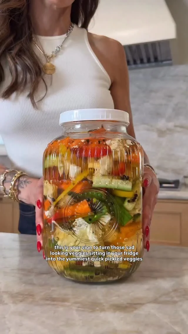 @kalejunkie QUICK PICKLED VEGGIES, such an easy way to use up all those veggies in your fridge. Growing up, my Dad used to make “torshi” using a salt fermentation process, which took TIME. I saw @sivanskitchen use a vinegar brine and I couldn’t believe how quick and delish. You get pickled veggies immediately 😊 TY Sivan! 
Comment LINKS if you want the link to these gorgeous jars (another Sivan rec!)
Veggies (just use what you have!)
1 head green cabbage
3 carrots, peeled
4 persian cucumbers 
1 head cauliflower 
2 bell peppers
6 cloves garlic 
Brine
6 cups filtered water 
2 cups white vinegar 
1/2 cup sugar
1/2 cup kosher salt 
3 tb peppercorns
6 bay leaves
2 tb oregano
Cut veggies into large pieces and place in a large bowl. In a large pot, add all of the ingredients to make the brine. Bring to a boil, then turn off the heat and let the brine cool. Then pour over the veggies and transfer to a storage jar of choice. Eat immediately or refrigerate and the pickled flavor will intensify over the days. Enjoy! #pickledveggies #torshi #nowasterecipes