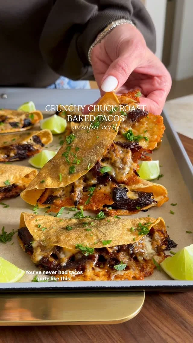 @kalejunkie CRUNCHY CHUCK ROAST BAKED TACOS WITH SALSA VERDE 🌮 such a yummy dinner and way to enjoy the chuck roast I shared in my last Reel (go look 👀)! This version of an italian inspired salsa verde is perfectly tangy to offset the savory meat and cheese, making for a truly memorable meal! So go make my chuck roast and then make THIS :)⁣
⁣
Be sure to SAVE this post and FOLLOW @kalejunkie for more recipes like this!⁣
⁣
Miso Ginger & Orange Chuck Roast⁣
👉🏼 See my last Reel for full recipe!⁣
3 1/2-4 lbs chuck roast⁣
1/2 cup orange juice ⁣
1/2 cup low sodium soy sauce⁣
3 tb white miso paste⁣
3 tb ginger paste (or 3” knob, peeled & grated)⁣
2 tb honey or maple syrup or brown sugar⁣
4 cloves garlic, mashed⁣
1 tsp ground black pepper⁣
1 tsp red chili flakes⁣
⁣
Salsa verde⁣
1/3 cup olive oil ⁣
2 tb capers⁣
2 garlic cloves⁣
1 lemon, zested and juiced⁣
1 packed cup parsley leaves⁣
⁣
Tacos⁣
8-12 thin corn tortillas⁣
1 1/2 cups shredded cheddar cheese (I like @organicvalley spicy cheddar)⁣
Parsley for garnish⁣
⁣
First, make the salsa verde. Add all of the ingredients into a mini food processor and process, leaving some texture. Taste and adjust as needed. Preheat oven to 400F. Line a baking sheet with parchment paper. Start by making the tortillas nice and pliable. Wrap the tortillas in a damp towel and place them in the microwave for 30 seconds, or until they’ve softened. Once the tortillas are soft, add a few spoonfuls of cheese to one side of the tortilla, followed by a generous amount of the chuck roast meat and a little more cheese. Gently fold the tortilla to the other side and press to close. Repeat. Once done, take a second baking sheet and place it on top of the first baking sheet with the tacos (this keeps them closed). Place the tray in the oven for 12 minutes, removing the top tray around the 10 minute mark and turn on the broiler for the last 2 minutes, so the tacos get crispy on top. Be sure to watch the tacos carefully, so they don’t burn. Garnish with chopped parsley, dip into the salsa verde and enjoy! #chuckroast #chuckroasttacos⁣
⁣