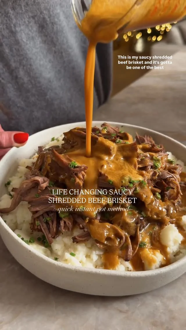 @kalejunkie LIFE CHANGING SAUCY SHREDDED BRISKET in the instant pot—bc no one has time to wait 8 hours to eat this deliciousness. I will go on the record and tell you that this is one of the best meals I’ve had in my life, a restaurant could never 😏. The sauce is incredible! Serve as desired—we love truffle mashed potatoes and a side of broccoli!

NOTE: you CAN do ALL the prep in the instant pot bc the instant pot has a saute function. I choose not to bc you will get a better sear on the meat and there’s just more room to do it all in a large pot, then transfer to the instant pot. 

Comment LINK and I will DM you the link to my instant pot!

Makes 10-12 settings
2 1/2 lbs beef brisket, cut into 2-3 pieces
2 tb avocado oil
3 carrots, peeled and diced
1 small yellow onion, diced
6 cloves garlic, sliced
1 tb smoked paprika
2 tsp dried thyme
1 tsp ground black pepper
1 tsp kosher salt
2 tb tomato paste
1 tb Worcestershire sauce (or steak sauce)
2 1/2 cups beef broth
1 lime, juiced (~3 tb)
Garnish: 1 bunch chives, finely chopped

Generously rub brisket with salt and pepper. In a large pot, add the avocado oil. One pot is very hot, add the brisket pieces, fat side down. Leave undisturbed for 5-6 minutes then flip to the other side once you have a great sear and leave undisturbed for 5 more minutes. Remove the meat from the pot and lower heat to medium. Add the carrots, onions and garlic, sautéing for 4 minutes or so, then add in the spices, tomato paste, Worcestershire sauce and broth. Mix together and let cook for 3-4 minutes then transfer the mixture to an instant pot, and add the brisket back in. Squeeze the lime inside the pot. Cover and set to high pressure for 1 hour 40 minutes. Once done, do a quick release. For the sauce, simply take the liquid and blend using an immersion blender or regular blender. Plate as desired and pour sauce on top. Garnish with fresh chives and enjoy! #brisket #instantpot #instantpotrecipes