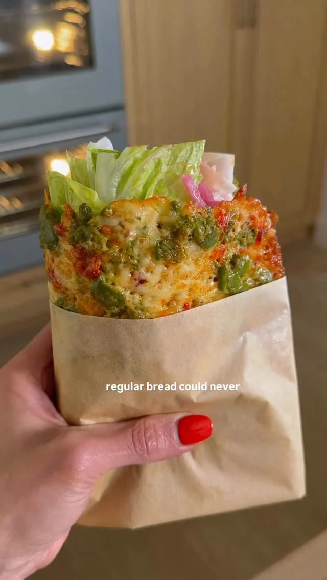 @kalejunkie 👈🏼 make my SPICY SMASHED OLIVE WRAP because it is INCREDIBLE!!! It’s a mix of olives, parmesan, mozzarella cheese and calabrian chili paste for a wrap you’ll be making on repeat! You can fill yours with anything you have on hand—mine is turkey, prosciutto, pickled onions and lettuce and that’s it. A filling and deeelish lunch!⁣
⁣
👉🏼 SHARE this post with friends and FOLLOW @kalejunkie bc I have 5 more wraps like this!⁣
⁣
Recipe:⁣
1/2 cup castlevetrano olives, pitted⁣
1/2 cup shredded mozzarella cheese ⁣
1/2 cup grated parmesan cheese⁣
1-2 tsp calabrian chili paste⁣
⁣
Preheat oven to 375F. Line a quarter baking sheet with parchment paper. Drain liquid from olives and smash them flat with a knife. Remove any extra moisture with a paper towel. Transfer to a bowl and mix with the cheeses and calabrian chili paste. Spread mixture into a neat rectangle shape, pressing it down and making sure the cheese is packed together. Bake for 16-18 minutes. Check at the 13 minute mark and if the edges are browned you can pull it out of the oven. Use a paper towel to soak up any oil and let the wrap sit to cool and harden before lifting it off of the tray. Remove from the tray, flip it over, and fill with your favorite fillings and enjoy.⁣
⁣
low carb recipes | keto | keto wrap | cheese wrap | sandwich ideas | sandwich recipes | viral recipes | food trends