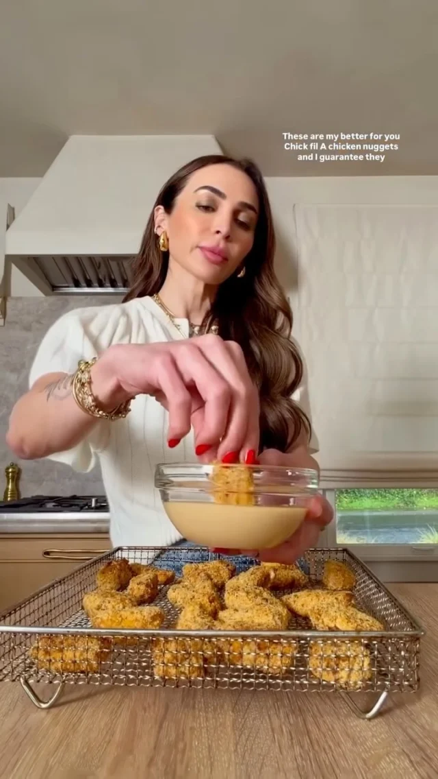 @kalejunkie BETTER FOR YOU CHICK-FIL-A CHICKEN NUGGETS and copycat dipping sauce! You cannot miss this recipe—these nuggets are highly addictive in the best way possible and you can make them in the air fryer or in the oven. Whether you have kids or not, this healthy recipe is what YOU need. And whatever you do, do not skip the sauce—chef’s kiss 🤌🏼🤌🏼⁣
⁣
Makes 4 servings⁣
CHICKEN NUGGETS⁣
2 lbs boneless skinless chicken breasts
2 eggs⁣
3 tb dill pickle juice ⁣
1/2 cup Italian herb breadcrumbs⁣
1 cup almond flour ⁣
1 tsp smoked paprika ⁣
1 tsp kosher salt⁣
1/2 tsp black pepper⁣
⁣
CHICK-FIL-A DIPPING SAUCE⁣
2 tb honey⁣
2 tb bbq sauce⁣
4 tsp dijon mustard ⁣
1/2 cup mayo or greek yogurt⁣
⁣
Cut chicken breast into bite-size pieces. In one bowl, whisk together the eggs and pickle juice. In another bowl, mix together the almond flour, breadcrumbs, paprika, salt, and pepper. Dip each nugget into the egg mixture and then into the flour mixture, pressing down the mixture into the crevices of each chicken piece and ensuring that each piece is coated well. Repeat this process with all of the chicken nuggets.⁣
⁣
Air fryer: preheat to 400°F. Spray the basket with oil spray and add the chicken pieces in an even layer. You might have to work in batches. Air fry for 12 minutes, flipping halfway through.⁣

Oven: preheat to 450°F. Add the chicken to a parchment or foil lined baking sheet. Bake on the middle rack for 6 minutes, then flip to the other side and bake for another 6 minutes.⁣
⁣
Prepare the dipping sauce. Add all of the ingredients to a small bowl and mix together well. Taste and adjust as needed. Serve the chicken nuggets with the sauce immediately and enjoy! ⁣
⁣