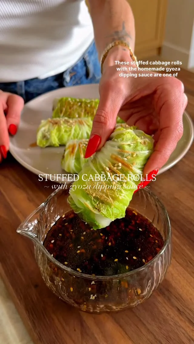 @kalejunkie CABBAGE DUMPLINGS WITH GYOZA DIPPING SAUCE! 🤗 There are so many versions of this around but let me tell you—THIS version is top tier! I am pretty happy to see cabbage getting the love it deserves in 2026 because it is one of my all time favorite veggies. Hope you love this recipe!⁣
⁣
FOLLOW 👉🏼 @kalejunkie 👈🏼 for more fun, easy recipes like this and SHARE with friends!⁣
⁣
1 large napa cabbage ⁣
2 tsp avocado oil, divided⁣
1 lb ground turkey ⁣
2 carrots, shredded⁣
1 8oz package mushrooms, very finely chopped ⁣
1 bunch scallions, sliced thinly⁣
1/2 cup dark soy sauce⁣
1 tsp Chinese 5 spice⁣
3/4 cup cooked rice⁣
⁣
Dipping sauce⁣
1/2 cup low sodium soy sauce or coconut aminos⁣
2 1/2 tb rice wine vinegar⁣
1 tb sesame oil⁣
2 cloves garlic, mashed⁣
2 tsp grated/minced ginger ⁣
1 tb sriracha sauce⁣
2  sesame seeds⁣
1 green onion, sliced (optional)⁣
⁣
In a small bowl, add the soy sauce, vinegar, sesame oil, garlic, ginger, sriracha, sesame seeds, and green onions, if using. Whisk well, then set aside. Bring a large pot of water to a boil. Once boiling, drop 4-5 cabbage leaves into the water at a time. Remove immediately after 1-2 minutes then transfer to a paper towel to cool. Repeat the process until you’ve used the entire cabbage. Next, make the filling. In a large skillet over medium high heat, add 1 tsp of the avocado oil. Once the pan is hot, add the turkey, carrots, mushrooms, soy sauce and Chinese 5 spice, breaking down the turkey into small pieces until cooked through. Finally, add the cooked rice and scallions, mixing until everything is evenly coated. Remove the skillet from the heat. Next, layer two of the prepared cabbage leaves onto a plate, so that they’re overlapping as shown in the video. Place one heaping spoonful (2-3 tb) of the filling toward the stem of the cabbage, then fold over, tucking in the edges neatly as shown. Repeat the process. Once you have all of the rolls prepared, heat a pan over medium heat. Add remaining oil. Add the rolls to the skillet and leave undisturbed for 2-3 minutes, then flip to the other side and leave undisturbed another 2 minutes. Repeat process with remaining rolls. Serve with dipping sauce and enjoy!⁣
⁣