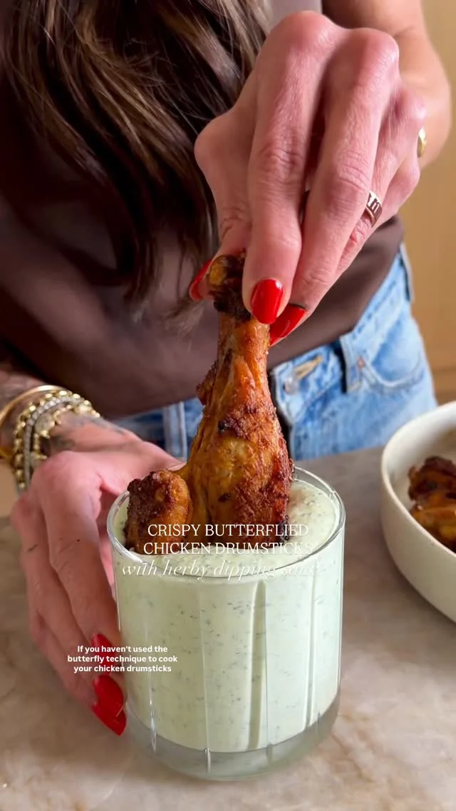 CRISPY BUTTERFLIED CHICKEN DRUMSTICKS WITH HERBY SAUCE—recipe on @kalejunkie or here https://kalejunkie.com/crispy-butterflied-chicken-drumsticks/. ENJOY!