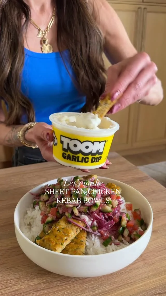 VIRAL SHEET PAN CHICKEN KEBABS—if you haven’t made them yet, make MY version (brought to you by @toom). The spices taste just like kebabs that I grew up with and it’s made even better with @toom garlic dip, which is my most favoriteeeee spread/dip ever ever! I have tried to make garlic spread myself and let me tell you, truly nothing compares to the texture and taste of Toom. It’s garlic heaven but at the same time, it’s not pungent, which I love! It’s absolute perfection and now you can get it at select Costco locations — so be sure to check the Toom store locator to see if it’s at yours! #toom #costcofinds #garlicdip #costohaul

Chicken Kebabs
2 lbs ground chicken
1/2 yellow onion
4 garlic cloves
1 red bell pepper
2 tsp oregano
2 tsp cumin
2 tsp kosher salt
1 tsp ground black pepper
1 tsp turmeric
1/4 cup parsley

Salad
2 persian cucumbers, chopped
1/2 red onion, sliced
2 roma tomatoes, chopped
2 tb sumac
2 tb red wine vinegar
2 tb avocado oil
1 tsp kosher salt

2 cups cooked jasmine rice
1/2 cup @toom spread

Preheat oven to 375F. First, make the kebabs. In a small food processor, blend the onion, bell pepper and garlic. It will be liquidy. Transfer to a bowl and use a paper towel to remove as much moisture as possible. Next, add chicken to a large bowl along with the onion/bell pepper/garlic mixture, seasonings, and parsley. Mixed very well until incorporated. Spread the chicken mixture evenly in a flat layer on a greased quarter sheet pan. Make cuts horizontally and vertically just like kebabs you see! Bake for 20 minutes, then broil for an additional 4-5 minutes until golden on top. Remove from oven, cut chicken along the horizontal lines you previously cut, to separate the kebabs. To make the salad, chop the veggies and toss with the vinegar, avocado oil, sumac and salt. Make the rice and assemble bowls, with rice on bottom, chicken on top, followed by a heaping spoonful of Toom and salad. Enjoy!