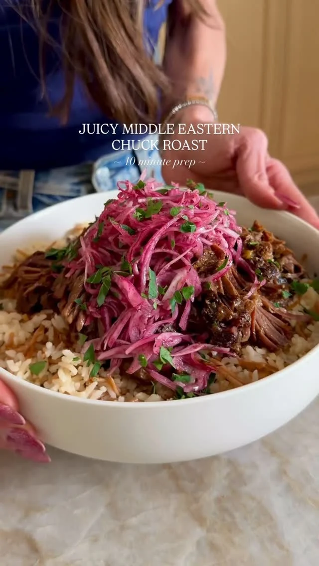 @kalejunkie 😍 EASY MIDDLE EASTERN CHUCK ROAST, aka the perfect cozy meal that you can use in a variety of different ways all week. This one is bursting with flavor thanks to the spices, flavorful marinade, and the acidity from the lemon which tenderizes the meat and makes it shred super easily. The best part is that it takes less than 10 minutes of prep time and you can sit back and let your oven do the rest!⁣
⁣
👉🏼Make sure to FOLLOW @kalejunkie to see the ways I enjoy this meat during the week!⁣
⁣
Makes 12 servings⁣
3 1/2 lbs chuck roast ⁣
1 1/2 cups beef broth⁣
3 tb honey ⁣
5 cloves garlic, minced⁣
2 tb sumac ⁣
2 tsp turmeric ⁣
1 1/2 tsp cumin⁣
1/2 tsp coriander ⁣
2 tsp kosher salt ⁣
1 tb Aleppo pepper (optional—or do 2 tsp paprika + 1/2 tsp cayenne pepper instead)⁣
1 lemon, juiced⁣
⁣
Sumac onions⁣
1 red onion, finely sliced⁣
2 tb sumac⁣
1 tb red wine vinegar⁣
1/2 tsp kosher salt⁣
⁣
Vermicelli rice⁣
2 tb butter⁣
1/2 cup vermicelli noodles, crushed ⁣
1 cup basmati rice, rinsed⁣
1 1/2 cups water⁣
1 tsp kosher salt⁣
⁣
Preheat oven to 325F, then make the marinade. In a medium bowl, whisk together the broth, honey, garlic, sumac, turmeric, cumin, coriander, salt, Aleppo pepper (if using) and lemon juice. Pat dry the chuck roast and season both sides with s&p. Place in a dutch oven. Pour the marinade on top. Cover and place in the oven for 3 1/2-4 hours. Pull it out at the 3 1/2 hour mark and use two forks to pull the meat apart. If it’s not easily shredding, pop it back in the oven for 30 minutes more. Once ready, remove from the oven, shred the meat and toss with the juices. If you want to brown the meat for crispy bits, place back in the oven under the broiler for 3-4 minutes.⁣
⁣
To make the sumac onions, slice the onions, add them to a bowl and toss with sumac, vinegar, and salt. To make the vermicelli rice, melt butter in a sauce pan over medium heat. Once melted, add the noodles and stir until brown (not burned, but BROWN). Watch it carefully. Then add in the basmati rice, water and salt. It will sizzle. Stir together well, then cover, turn heat to low, and let cook for 18-20 minutes. Remove cover, fluff and enjoy!⁣