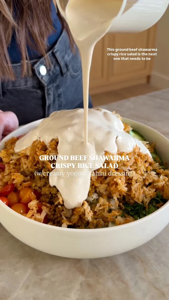 👉🏼 @kalejunkie’s BEEF SHAWARMA CRISPY RICE SALAD, the latest and greatest in the KJ crispy rice collection (I think this is #10?!). This one has all the flavors of beef shawarma, but it’s made with ground beef bc it’s easy and quick! This salad is bursting with flavor and it’s all tossed in a creamy yogurt-tahini dressing for the WIN! It makes 4 large meal salads and makes great leftovers too.⁣
⁣
SAVE this post, SHARE with friends, and FOLLOW me @kalejunkie for more delicious recipes!⁣
⁣
Makes 4 large servings⁣
Crispy Rice⁣
2 cups cooked rice, cooled (I used jasmine rice)⁣
1 tb olive oil, 1 tsp paprika, 1 tsp oregano, 1/2 tsp garlic powder⁣
⁣
Beef shawarma⁣
1 lb lean ground beef (90/10)⁣
4 cloves garlic, minced⁣
1 tb smoked paprika⁣
2 tsp cumin⁣
1 tsp coriander⁣
1 tsp turmeric⁣
1/2 tsp cinnamon⁣
1/4 tsp cayenne pepper⁣
1/2 tsp kosher salt⁣
⁣
Tahini dressing⁣
3/4 cup greek yogurt ⁣
1/4 cup tahini⁣
2 tb maple syrup⁣
2 lemons, juiced (1/4 cup)⁣
1/2 tsp cinnamon⁣
2 cloves garlic⁣
1 tsp kosher salt⁣
[water to thin]⁣
⁣
Salad⁣
5 persian cucumbers, sliced thin⁣
1 cup baby tomatoes, halved⁣
1 bunch mint (1/2 cup), finely chopped⁣
3/4 cup dill pickles, chopped⁣
1/4 cup pickled onions (optional)⁣
1/4 cup feta cheese, crumbled⁣
⁣
First, prepare the crispy rice topping. Preheat oven to 400F. Add cooked and cooled rice to a baking sheet. Toss with the olive oil and seasonings. Bake for 20-22 minutes, tossing half way through (watch to make sure it doesn’t burn). While the rice is in the oven, make the beef shawarma. Add a touch of olive oil to a skillet over medium heat. Once the skillet is hot, add the ground beef, along with the garlic and seasonings. Stir until fully cooked through, breaking down the meat into small pieces, then remove from heat. Remove the crispy rice from the oven and set aside. Next, chop/slice all of the ingredients for the salad and add to a large bowl. Add the beef and crispy rice on top. Make the dressing. Blend ingredients for the dressing until smooth & creamy. Taste and adjust seasonings as needed. Pour over the salad. Toss and enjoy! ⁣