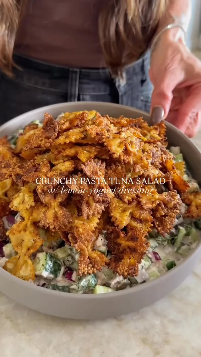 @kalejunkie CRUNCHY PASTA TUNA SALAD WITH LEMON YOGURT DRESSING, truly one of the best salads I’ve made and a nice change from crispy rice salads lol. For this one, I am using @wildplanetfoods skipjack tuna, which is sustainably caught, and packed with omega-3s and protein. Let me tell you, if you make one thing from me, let it be this 👏🏼!!
⁣
Pasta Chips⁣
1/2 lb farfalle pasta, cooked⁣
1 tb olive oil⁣
1 tsp paprika⁣
1/2 tsp garlic powder⁣
1/2 tsp onion powder⁣
1 tsp salt⁣
3 tb grated parmesan cheese⁣
⁣
Dressing⁣
1 cup plain greek yogurt⁣
2 tb maple syrup⁣
1 tb olive oil⁣
1 tsp dijon mustard⁣
3 cloves garlic, minced⁣
1 lemon, juiced⁣
1 tsp salt, 1/2 tsp pepper, 1/2 tsp red pepper flakes ⁣
Water as needed to thin⁣
⁣
Salad⁣
2 cans @wildplanetfoods skipjack tuna⁣
4 persian cucumbers, chopped⁣
4 dill pickles, chopped⁣
1/2 red onion, finely diced⁣
1/4 cup fresh dill, chopped⁣
⁣
To make the pasta chips in the oven—preheat oven to 400F. spread cooked pasta onto a baking sheet in an even layer. Drizzle with olive oil and seasonings. Toss to coat well. Sprinkle with parmesan cheese. Bake for 25-28 minutes, flipping halfway through. For air fryer, do the same, except add everything to the air fryer basket and air fry for 10 minutes. Set aside. Next, make the dressing. In a bowl, whisk together the yogurt, maple syrup, olive oil, mustard, garlic, lemon, salt, pepper and red pepper flakes. If it is thick, add water to desired thinness. Taste and adjust seasonings and set aside. Next, in a small bowl, add the tuna and mash into small pieces with a fork. Then transfer to a large salad bowl and add the cucumbers, pickles, onion, and dill. Pour dressing on top and toss to coat well. Finally, add the pasta chips on top and toss again. Enjoy immediately. #wildplanetfoods #wildplanetrecipe #sustainableseafood #wildplanetpartner