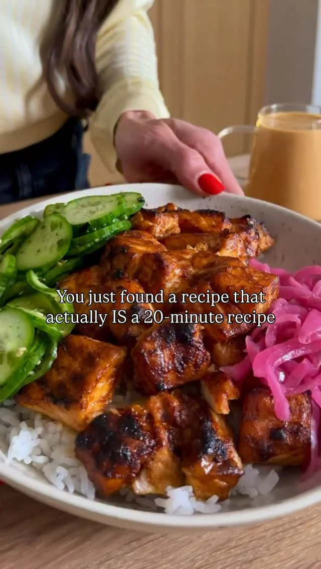 FOLLOW me @kalejunkie and you’ll get more recipes like this 20-MINUTE BANG BANG SALMON BOWL! The salmon cooks under the broiler in 8 minutes, for a crunchy outside and they melt in your mouth, and while that’s in the oven you have time to make the tangy cucumber salad and yogurt-based bang bang sauce (no mayo bc i am not a mayo fan 🙅🏻‍♀️). I also used frozen jasmine rice to make this dinner even quicker. Hope you love it as much as I do!

SAVE this post, SHARE with friends, and FOLLOW me @kalejunkie for more easy dinners like this:)

Makes 4 servings
SALMON
1 1/2 lbs salmon, cubed
1 tb avocado oil
1/4 cup low sodium soy sauce
2 tsp smoked paprika
1/2 tsp chili powder
1 tsp garlic powder
1/2 tsp kosher salt

BANG BANG SAUCE
1 cup greek yogurt (I like full fat)
1/4 cup sriracha
2 tb rice vinegar 
1/4 cup low sodium soy sauce
2 tb honey
1 tsp fresh grated ginger 
1/2 tsp crushed red pepper flakes

CUCUMBER SALAD
2 persian cucumbers
1 tb rice vinegar 
1 tb furikake seasoning

First, cut your salmon into cubes and add to a bowl. I slice the skin off but that is OPTIONAL. Add the avocado oil, soy sauce, and seasonings and toss to coat well. Transfer to a foil (or parchment paper) lined baking sheet. Broil on high for 8 minutes then remove from oven and set aside. Cook rice and set that aside too. Next, make the cucumber salad and bang bang sauce. For the cucumber salad, slice the cucumbers, add to a small bowl, and toss with the rice vinegar and furikake. To make the bang bang sauce, add all the ingredients to a bowl and whisk until smooth. Taste and adjust as needed. Finally, assemble your bowls, with the rice on the bottom, the salmon, cucumber salad and bang bang sauce.