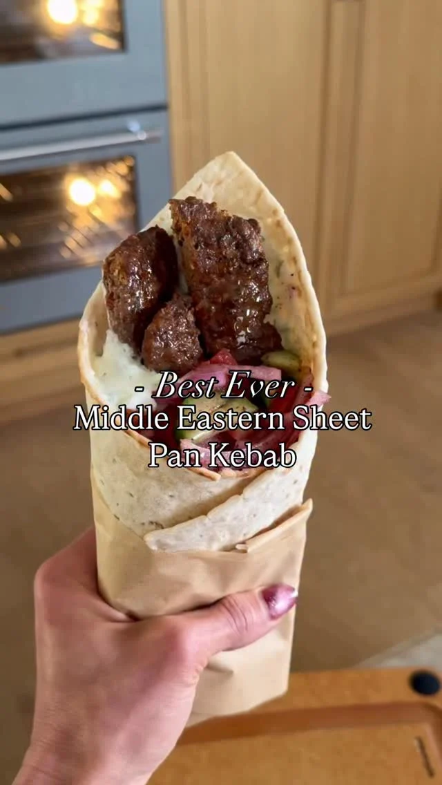Follow me @kalejunkie for recipes like my JUICY SHEET PAN MIDDLE EASTERN BEEF KEBABS, seasoned just like my dad used to make when I was growing up! These kebabs are so juicy and flavorful, you will be obsessed! You can serve however you like—in lavash, pita, over rice, etc.

Makes 6-8 servings
2 lbs ground beef (I like 85/15 for juicer kebabs, but leaner works too!)
1/2 white onion
1 red bell pepper
4 cloves garlic
1/4 cup parsley, chopped
2 tb tomato paste
2 tsp cumin
2 tsp paprika
2 tsp aleppo pepper (optional but recommend)
1 tsp ground black pepper 
1 1/2 tsp kosher salt

Salad
2 persian cucumbers, chopped
1/2 red onion, sliced
2 roma tomatoes, chopped
2 tb sumac
2 tb red wine vinegar
2 tb avocado oil
1 tsp kosher salt

Yogurt sauce
1 cup greek yogurt
1 Persian cucumber, grated, liquid pressed out
1/2 lemon
1/2 tsp kosher salt

Lavash

Preheat oven to 375F. First, make the kebabs. In a small food processor, blend the onion, bell pepper and garlic. It will be liquidy. Transfer to a bowl and use a paper towel to remove as much moisture as possible. Next, add the beef to a large bowl along with the onion/bell pepper/garlic mixture, parsley, and seasonings. Mix very well until incorporated—I like to use my hands. Spread the beef mixture evenly in a flat layer on a greased quarter sheet pan. Make cuts horizontally and vertically just like kebabs you see at a restaurant! Bake for 20 minutes, then broil for an additional 4-5 minutes until golden on top. Remove from oven, cut beef along the horizontal lines you previously cut, to separate the kebabs. To make the salad, chop the veggies and toss with the vinegar, avocado oil, sumac and salt. Make the yogurt sauce and serve as desired. On a lavash, spread yogurt mixture, add th