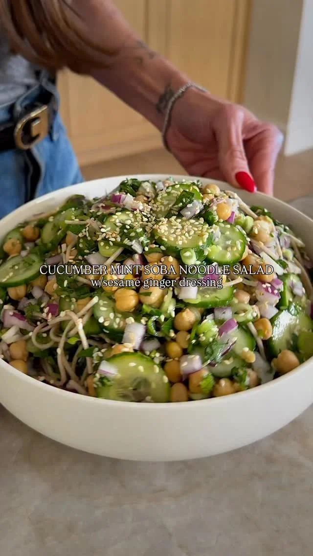 @kalejunkie CUCUMBER MINT SOBA NOODLE SALAD W/SESAME GINGER DRESSING and it is the most perfect salad for summer like OMG! It is light, refreshing, crunchy and has so many textures and flavors happening at once, it is a WINNER! Soba noodles also hold up so well in the fridge, so you can meal prep this once and enjoy it for multiple days in a row. If you need more protein, simply add some salmon or chicken and you are good to go.⁣
⁣
SAVE this post, SHARE it with friends, and FOLLOW me @kalejunkie for more easy recipes like this!!⁣
⁣
Makes 4 to 6 servings⁣
Sesame Ginger Dressing:⁣
1/4 cup avocado oil⁣
3 tb toasted sesame oil⁣
3 tb maple syrup⁣
1 tb ginger paste/freshly grated ginger⁣
2 limes juiced⁣
1/2 tsp kosher salt⁣
⁣
Soba Noodle Salad:⁣
1 9oz package soba noodles⁣
5 persian cucumbers, thinly sliced⁣
1 can garbanzo beans, drained and rinsed well⁣
1/2 cup chopped mint, packed⁣
1/4 cup italian parsley, chopped⁣
1/2 red onion, finely diced⁣
1 bunch green onion, sliced⁣
3 tb sesame seeds⁣
⁣
First, prepare the dressing. In a small bowl, whisk together the dressing ingredients. Taste and set aside. Next, bring a large pot of water to a boil. Add the soba noodles and cook for 4 minutes (or according to package instructions). Drain and rinse with cold water to stop the cooking, and transfer to a large mixing bowl. Add the rest of the salad components: cucumbers, garbanzo beans, mint, parsley, red onion, green onion, and sesame seeds. Pour the dressing over the salad and toss to coat well. Plate and enjoy! #sobanoodlessalad #summerrecipes