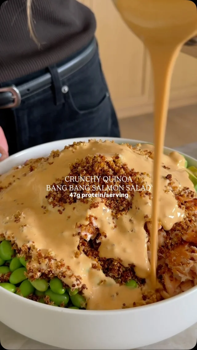 @kalejunkie ✨ NEW ✨ CRUNCHY QUINOA BANG BANG SALMON SALAD! AHHHHH, this is one of the greatest salads of all time and it is good for you! The bang bang sauce is so good I should bottle and sell it, and it’s protein packed and you can use any extra throughout the week. The salmon is broiled in the oven in just minutes and it all comes together with loads of veggies and that crispy quinoa that is the chef’s kiss! This recipe makes a lot—so save the extras and enjoy all week!⁣
⁣
SAVE this post, SHARE it with friends, and be sure to follow me @kalejunkie for more recipes like this! ⁣
And, if you want links to anything I’m using in this video, just comment LINK and I will DM you!⁣
⁣
Makes 4 big servings ⁣
CRISPY QUINOA⁣
1 1/2 cups cooked quinoa, cooled⁣
1 tsp avocado oil⁣
1 tsp low sodium soy sauce ⁣
⁣
BROILED SALMON⁣
1 1/2 lbs salmon⁣
2 tsp low sodium soy sauce ⁣
2 tsp honey⁣
⁣
BANG BANG SAUCE⁣
1 cup fat free greek yogurt⁣
1/4 cup sriracha⁣
2 tb rice vinegar ⁣
1/4 cup low sodium soy sauce⁣
2 tb honey⁣
1 tsp fresh grated ginger ⁣
1/2 tsp crushed red pepper flakes⁣
⁣
SALAD⁣
3 persian cucumbers, chopped⁣
1/4 red onion, finely diced⁣
3 green onions, finely chopped⁣
1 cup shelled edamame⁣
1 avocado, diced⁣
⁣
Preheat oven to 375F. Add the quinoa to a baking sheet. Toss with the oil and soy sauce and spread into an even layer. Bake 20-25 minutes or until golden and crunchy, stirring halfway through. Keep an eye during the cooking process so it doesn’t burn. While that’s in the oven make the bang bang sauce. Add all of the sauce ingredients to a mini blender and blend until smooth. When the quinoa comes out of the oven, turn the broiler on high to make the salmon. Add the salmon to a baking sheet - I recommend using foil > parchment paper but I didn’t have any. Mix the soy sauce and honey and brush it over the salmon. Broil for 8-9 minutes depending on your preferred doneness. Shred it using two forks and set aside. Finally, build your salad. In a large bowl, add the cucumbers, red onion, green onions, edamame, avocado, shredded salmon, and crispy quinoa. Pour dressing on top, optional sesame