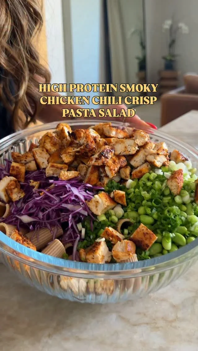 @kalejunkie High Protein Smoky Chicken Chili Crisp Pasta Salad 🥳 This protein-packed pasta salad is bursting with flavor! It’s loaded with veggies, topped with smoky chicken and all tossed in a creamy dressing to bring it all together! I’m using a high protein pasta, but use what you have/like! Macros: ~56g p • ~43g c • ~9g f

Comment LINKS for everything I’m using in this video and be sure to FOLLOW me @kalejunkie for more easy, protein-forward recipes! ♥️

Makes 6 servings 
Dressing
1 cup cottage cheese (fat free or low fat)
1 tb maple syrup 
2 cloves garlic
3 tb rice vinegar
1 lime
1 tb chili crisp or salsa macha
Water if needed to thin

Blackened chicken 
1 lb chicken tenders
2 tsp smoked paprika 
1 tsp cumin
S&P

Salad
12 oz pasta of choice (using @pastagarofalo high protein pasta)
4 persian cucumbers, diced
1 cup shredded red cabbage
1 cup shelled edamame
1 bunch green onion, thinly sliced

First, boil your pasta according to package instructions. Once al dente, rinse with cold water to stop the cooking and set aside. Then make the dressing. In a small blender, add all of the ingredients and blend until smooth; taste and adjust and set aside. Next, make the blackened chicken. Dry the chicken tenders and seasoned with the seasonings. Heat a large nonstick skillet over medium heat. Spray the pan lightly with oil spray. Once the pan is hot, add the chicken tenders and do not disturb them for about four minutes, then flipped to the other side. Remove from the heat once fully cooked through. Chop into bite-size pieces and set aside. Finally, chop all of your vegetables and add them to a large bowl. Add the cooked pasta and chicken. Tossed with the dressing and enjoy! #pastasalad #highproteinrecipes