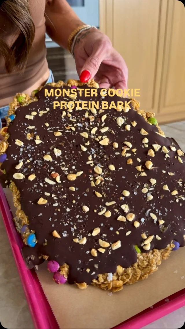 @kalejunkie 🍪 MONSTER COOKIE PROTEIN BARK, my fav no-bake sweet treat to break into pieces and enjoy all week long! My boys love it too, so it’s a win-win! Store it in the refrigerator, but I personally love it from the freezer—it hits different and it’s goes great broken down into tiny pieces and served over vanilla ice cream, just saying 😏. Macros: ~7g p • ~20g c • ~7g f⁣
⁣
SAVE this post, SHARE with friends and FOLLOW ME @kalejunkie if you want to see more recipes like this! ⁣
⁣
Makes 16 servings⁣
1 cup quick cook rolled oats⁣
1/3 cup powdered peanut butter (like PB2 or Naked PB)⁣
1/3 cup collagen powder (or protein powder)⁣
1/3 cup maple syrup⁣
1/4 cup coconut oil, melted⁣
2 tsp vanilla extract ⁣
1/2 cup salted peanuts⁣
3/4 cup @unreal.snacks chocolate gems ⁣
3/4 cup chocolate chips (@hukitchen)⁣
1 tsp coconut oil⁣
⁣
In a large bowl, mix together the oats, powdered PB, collagen, maple syrup, melted coconut oil and vanilla extract. Everything should be coated well. Add in most of the peanuts (reserving some to chop and use as topping) and the chocolate gems. Once everything is mixed together well, line a quarter sheet baking sheet with parchment paper press the mixture into an even layer. I like to spray my hands with oil spray so it’s easy to work with and doesn’t stick. Next, make the chocolate topping. In a small bowl, add the chocolate chips and coconut oil and microwave in 2 to 3, 30-second increments until smooth and fully melted. Pour the chocolate mixture over the top and spread into an even layer using a spatula. Crush remain remaining peanuts and spread over the top and sprinkle with flaky salt. Freeze for at least one hour to harden. Cut or break into smaller pieces and enjoy. #healthydesserts #monstercookies #proteindesserts