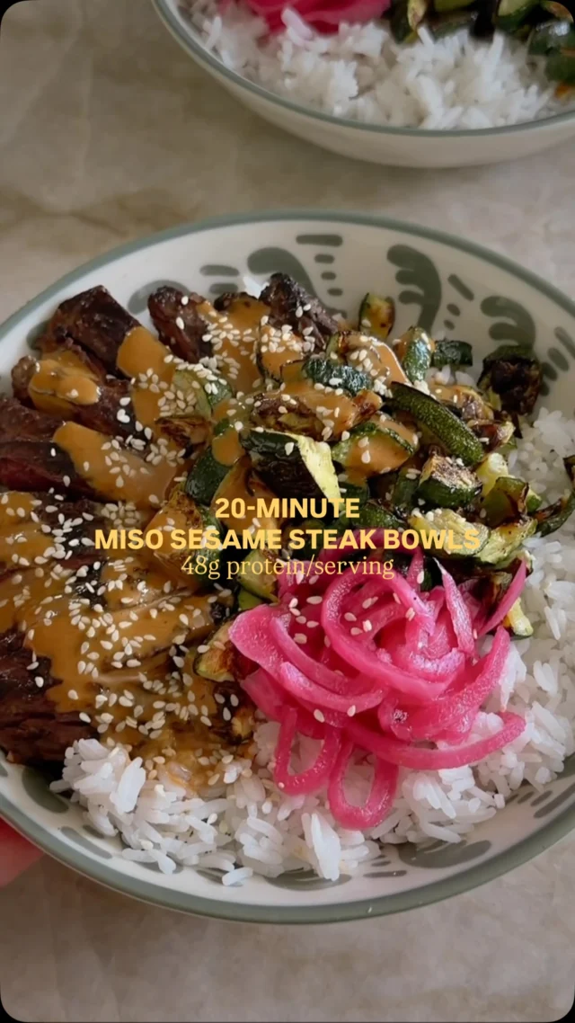@kalejunkie MISO SESAME STEAK & ZUCCHINI BOWLS, the meal of the entire summer and you can make it in 20 minutes, like for real! And, each serving packs ~48g protein! The marinade doubles as the sauce which is a huge game changer, saving you time, and zucchini is in peak season right now and it roasts in the oven while the rest of the meal cooks. I’m excited for you to make this. Like really excited. ⁣
⁣
Comment LINKS to everything I used in this video!⁣
⁣
Makes 4 servings ⁣
1 1/2 lbs flank steak (or skirt steak)⁣
3 tb white miso⁣
1/4 cup tahini⁣
3 tb rice vinegar⁣
3 tb low sodium soy sauce⁣
2 tb maple syrup ⁣
1 tb fresh chopped ginger (im using a ginger paste)⁣
1 large shallot ⁣
1/2 tsp ground black pepper⁣
⁣
3 large zucchini⁣
Avocado oil spray ⁣
S&P⁣
⁣
Serve with: ⁣
2 cups cooked jasmine rice⁣
pickled onions⁣ (optional)
⁣
Instructions: Preheat oven to 400F. Make the marinade. Whisk together the marinade ingredients in a large bowl. Pour 1/2 the mixture on top of the steak, coating it well. Reserve the rest for later. Cut the zucchini into small pieces 1/4” thick and spread the pieces onto on a large baking sheet. Spray lightly with avocado oil spray and sprinkle with salt and pepper. Toss with your hands and bake for 15-16 minutes. Remove the pan from the oven, toss and set aside. Next, make the steak. Spray a large nonstick skillet with avocado oil spray, over medium-high heat. Wait for the pan to get extremely hot. Once the pan is hot, add the steak. You might need to work in batches depending on the size of your steak. Do not touch or disturb the steak for 3 to 4 minutes before flipping to the other side. Let cook for another three minutes, undisturbed, then transfer to a cutting board to rest for 5 min before slicing. Note: I like my steak medium-rare, so just cook it longer if you like yours more well done. Finally, assemble bowls—cooked rice, steak, zucchini, and pickled onions (if using). Drizzle with remaining marinade/sauce and enjoy immediately! #summerdinnerideas #summerrecipes #steakrecipes #highproteinrecipes