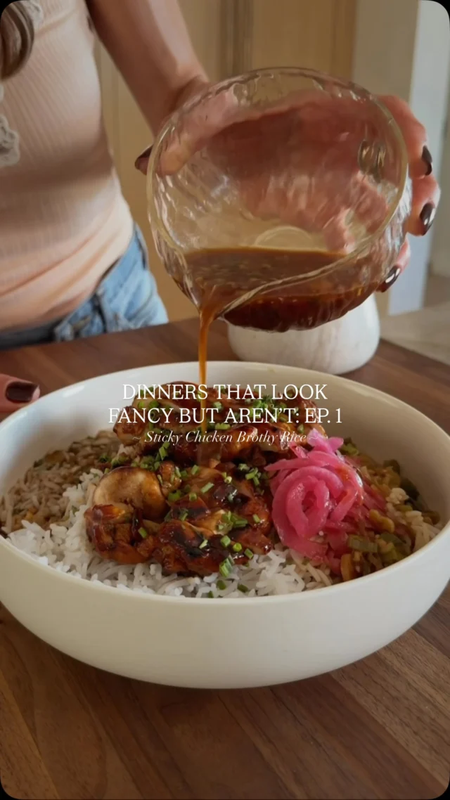 @kalejunkie ✨ EPISODE 1 of Dinners That Look Fancy, But Aren’t ✨ The rules: 25 minutes or less, at least 30g of protein per serving, and comfort food vibes without feeling heavy. First up: my new Sticky Chicken Brothy Rice Bowls with caramelized chicken, fluffy basmati rice, and a warm savory broth poured right over the top. This one has about 41g of protein per serving and proves that eating healthy does not have to mean boring food 🙌🏼 Approximate Macros: P: 41g • C: 42g • F: 20g

Be sure to FOLLOW me @kalejunkie for Ep. 2!

Makes 4 servings 
Sticky Chicken
1 1/2 lbs boneless, skinless chicken thighs
3 tb low sodium soy sauce
2 tb maple syrup
2 tb rice vinegar
2 tb hoisin sauce
2 tb oyster sauce
1 tsp sesame oil 
2 tb avocado oil

Broth
3 cups chicken broth (I used bone broth)
1/3 cup scallions, chopped
3 cloves garlic, minced 
2 tablespoons minced ginger 
3 tb low sodium soy sauce 
2 tb rice vinegar 

To serve: 2 1/2 cups cooked basmati rice
Optional: pickled onions

Pat dry the chicken and add to a bowl. Toss with the soy sauce, maple syrup, rice vinegar, hoisin, oyster sauce and sesame oil. Make sure everything is coated well and set aside. Heat avocado oil in a skillet over medium heat. Once the pan is very hot (important!), add the chicken. Do not touch for 5 minutes then flip. Pour 1/4 cup of the remaining marinade into the pan. Do not disturb the chicken for 5 minutes more. Once cooked through (internal temp of 165F), transfer chicken to a plate. Reduce heat to low, add the garlic, ginger and scallions, scraping up the bits from the bottom of the pan and saute for 2-3 minutes. Add the broth, soy sauce and rice vinegar and stir. Remove from the heat once warmed to your liking. Divide cooked rice between bowls. Slice the chicken and place on top of the rice. Last, pour the broth on top. Enjoy!