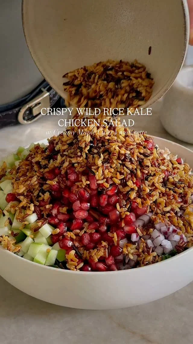 @kalejunkie CRISPY WILD RICE KALE CHICKEN SALAD with Creamy Maple Cider Vinaigrette 😏 Two words for this salad: LIFE CHANGING. Yes, a salad can be life changing and this one is IT. If you’ve made any of my viral crispy rice salads, you KNOW they slap. And this one? Think autumn vibes using wild rice instead of white (though that works too) and all the fall flavors in the base. It’s protein packed, fiber packed, and fantastic for meal prep too. Oh and it uses my fav time saving hack: rotisserie chicken. Hope I sold you 😏 go make it. ⁣
⁣
Makes 6 servings⁣
Salad⁣
2 cups cooked & cooled wild rice blend (to save time, I buy this frozen and defrost in microwave)⁣
2 tsp olive oil ⁣
1 1/2 cups white meat rotisserie chicken, chopped⁣
1 bunch curly kale, stems removed, very finely chopped, the finer the better!⁣
1 Granny Smith apple, finely diced ⁣
1/2 small red onion, finely diced ⁣
1/2 cup raw pecans, coarsely chopped⁣
3/4 cup pomegranate arils⁣
⁣
Maple Cider Vinaigrette⁣
1/2 cup avocado oil (I like @mariannesharvest)⁣
2 tb maple syrup⁣
1/3 cup apple cider vinegar⁣
1 tb Dijon mustard⁣
1 large shallot⁣
2 cloves garlic⁣
1/2 tsp kosher salt⁣
1/4 tsp ground black pepper⁣
⁣
Preheat oven to 400F. Spread cooked rice onto a baking sheet. Drizzle with the olive oil and a pinch of s&p. Toss to coat well and spread in an even layer. Bake for 40 minutes-ISH, tossing at the halfway point, until the rice is golden and crunchy. Just watch it so it doesn’t burn :) While the rice is in the oven, make the dressing. Add all of the ingredients to a small blender and blend until smooth. Taste and adjust as needed, and set aside. Finally, build your salad. In a large bowl, add the kale, chicken, apple, red onion, pecans, pomegranate and crispy rice. Pour dressing on top and toss to coat well. Serve and enjoy!⁣
#crispyricesalad #fallsalads