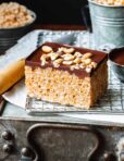 One of the classic peanut butter rice crispy treats, laid out on a wire cooling rack