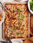 A tray of the sheet pan crunchy penne arrabiata, sitting on a countertop
