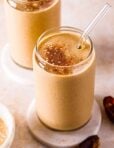 picture of a delicious snickerdoodle tahini smoothie with dates on the side